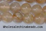 CAA1073 15.5 inches 10mm round sakura agate gemstone beads