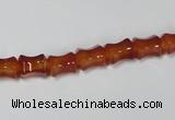 CAA142 15.5 inches 6*8mm bamboo shape red agate gemstone beads