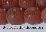 CAA3689 15.5 inches 12mm round matte & carved red agate beads
