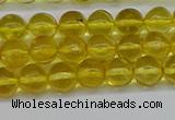CAR559 15.5 inches 6mm - 6.5mm round natural amber beads wholesale