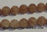 CBQ14 15.5 inches 10mm carved round strawberry quartz beads