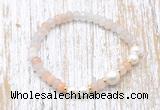 CFB711 faceted rondelle pink aventurine & potato white freshwater pearl stretchy bracelet