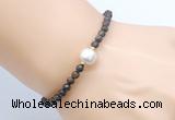 CFB830 4mm faceted round bronzite & potato white freshwater pearl bracelet