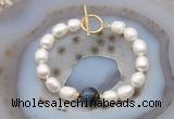 CFB979 Hand-knotted 9mm - 10mm rice white freshwater pearl & blue tiger eye bracelet