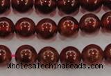 CGA602 15.5 inches 8mm A grade round natural orange garnet beads
