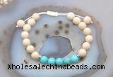 CGB6604 8mm round white fossil jasper & blue howlite adjustable bracelets