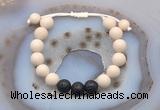 CGB6670 10mm round white fossil jasper & black lava adjustable bracelets