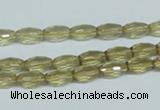 CLQ10 15.5 inches 6*10mm faceted rice natural lemon quartz beads