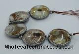 CNG2303 7.5 inches 35mm flat round agate beads with brass setting
