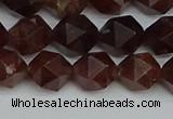 CNG7272 15.5 inches 10mm faceted nuggets orange garnet beads