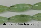 CRU167 15.5 inches 10*30mm faceted rice green rutilated quartz beads
