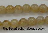 CRU551 15.5 inches 6mm round golden rutilated quartz beads