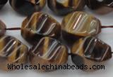 CTE1591 15.5 inches 12*16mm twisted rice yellow tiger eye beads