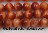 CTE1661 15.5 inches 6mm round sun orange tiger eye beads