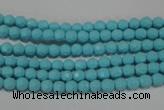 CTU1220 15.5 inches 4mm faceted round synthetic turquoise beads