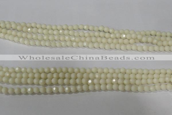 CTU1440 15.5 inches 4mm faceted round synthetic turquoise beads
