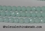 CTU2572 15.5 inches 6mm faceted round synthetic turquoise beads
