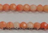 CTU2641 15.5 inches 4mm faceted round synthetic turquoise beads