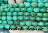 WBBS31 15 inches 11*14mm oval howlite turquoise gemstone beads wholesale